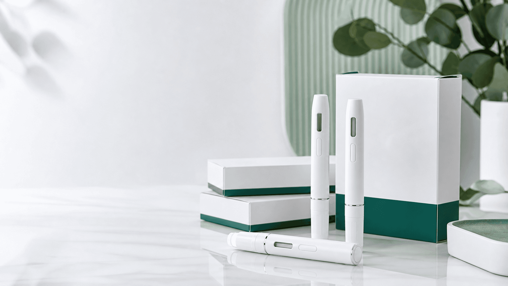 Clean studio photograph of weight-management pen packaging